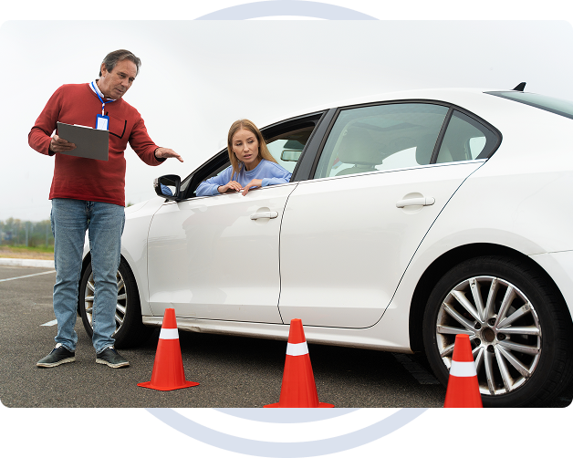 Driving instructor teaching highway code